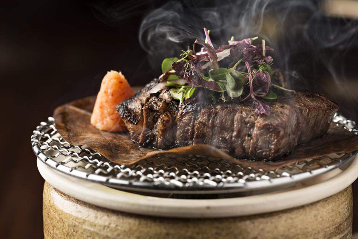 Steaks are robata grilled at Novikov.