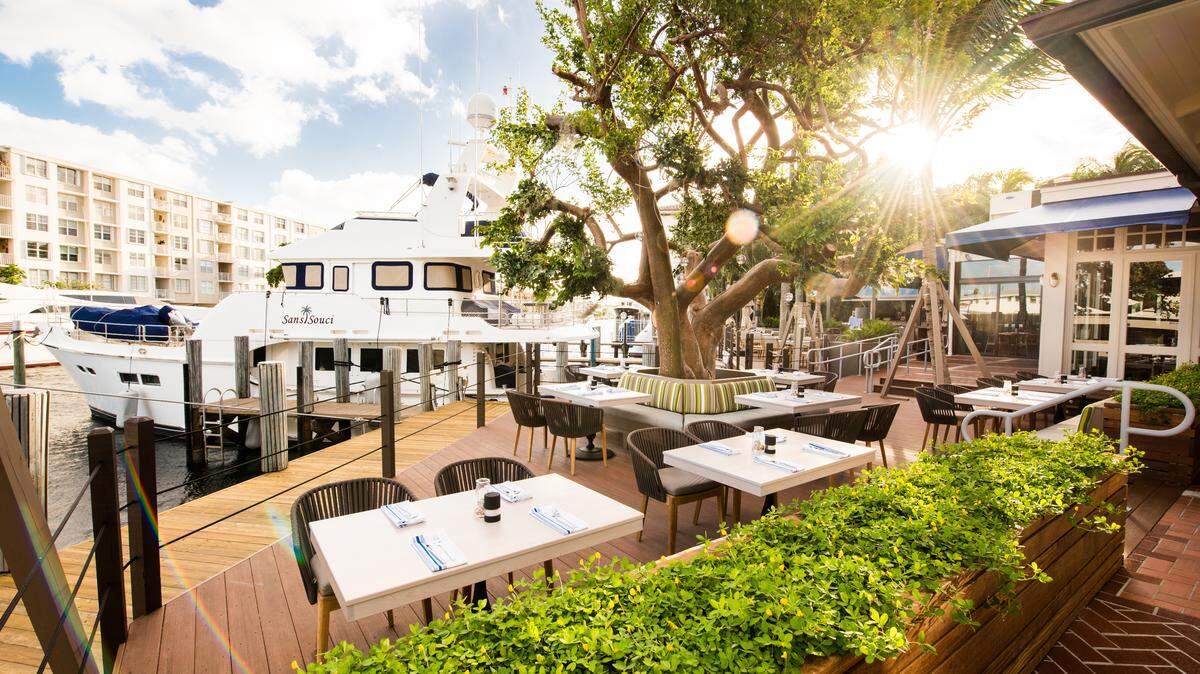Waterfront view and tree in outdoor patio at Boatyard Restaurant. Handout