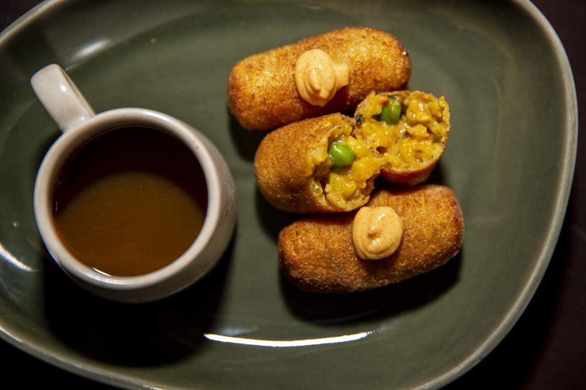 Café La Trova features the return of Bernstein’s creamy croquetas. These are stuffed with paella.