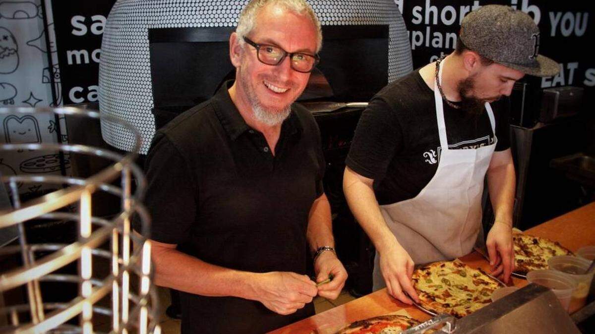 Michael Schwartz is joining the trend of award-winning chefs opening casual, replicable restaurants as Harry’s Pizzeria becomes Genuine Pizza and will expand to 18 restaurants in the next three years. Genuine Hospitality Group