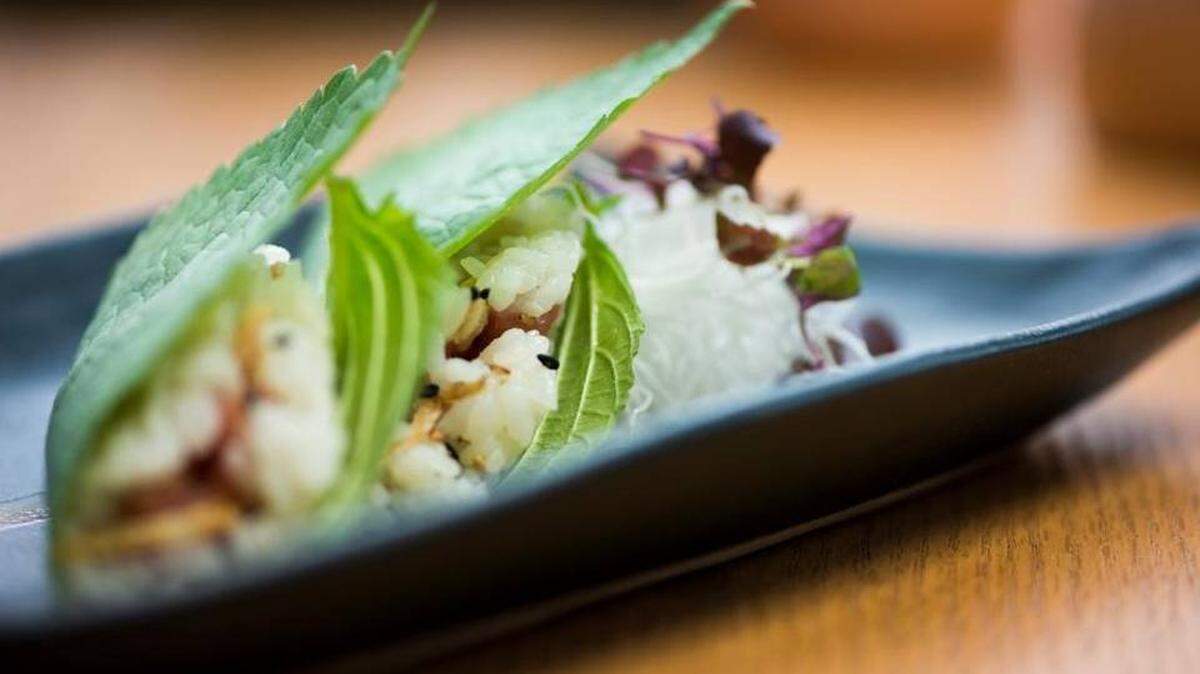 The sesame leaf taco is a unique and delicate twist on the traditional bite.