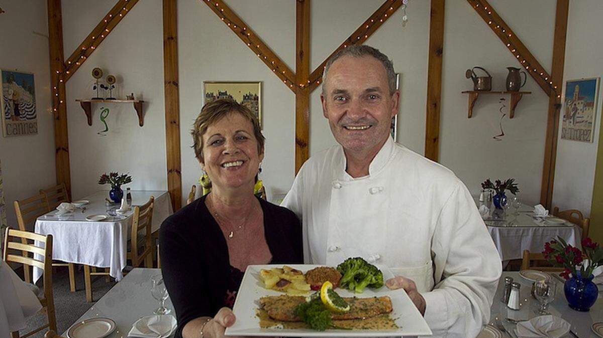 BEHIND THE FOOD: Marilyse and Christian LePadellec have operated Le Petit Café in Dania Beach, a storefront French-American restaurant serving traditional fare, for 17 years.