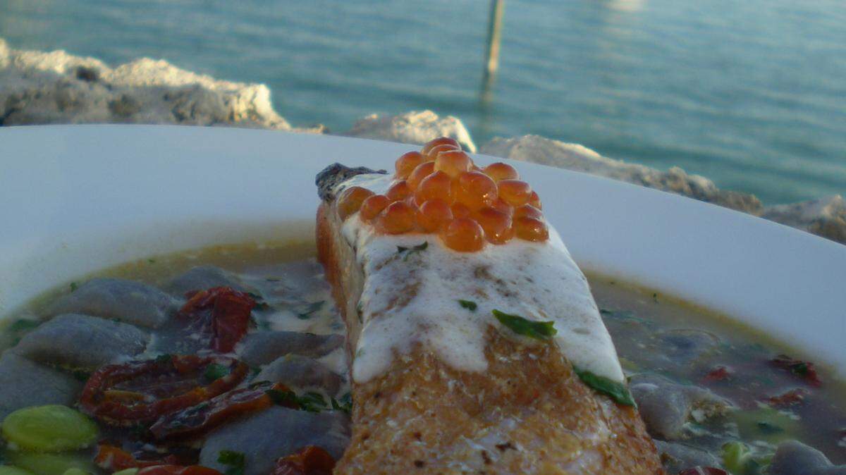 MIAMI BEACH: Poached salmon in lemon-caviar sauce with purple potato gnocchi at Malus on the Bay.
