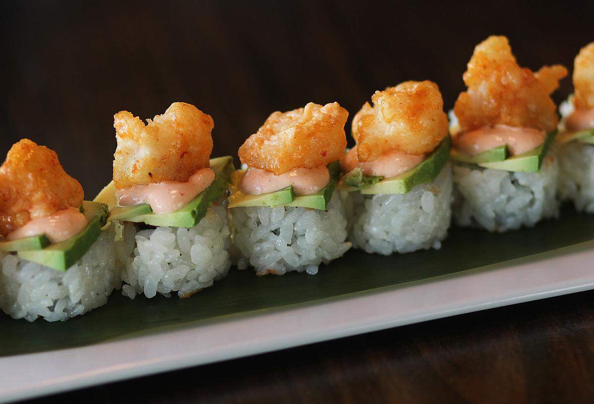 Food detail for Pubbelly story, Rockshrimp tempura,avocado mango,tuna tartare