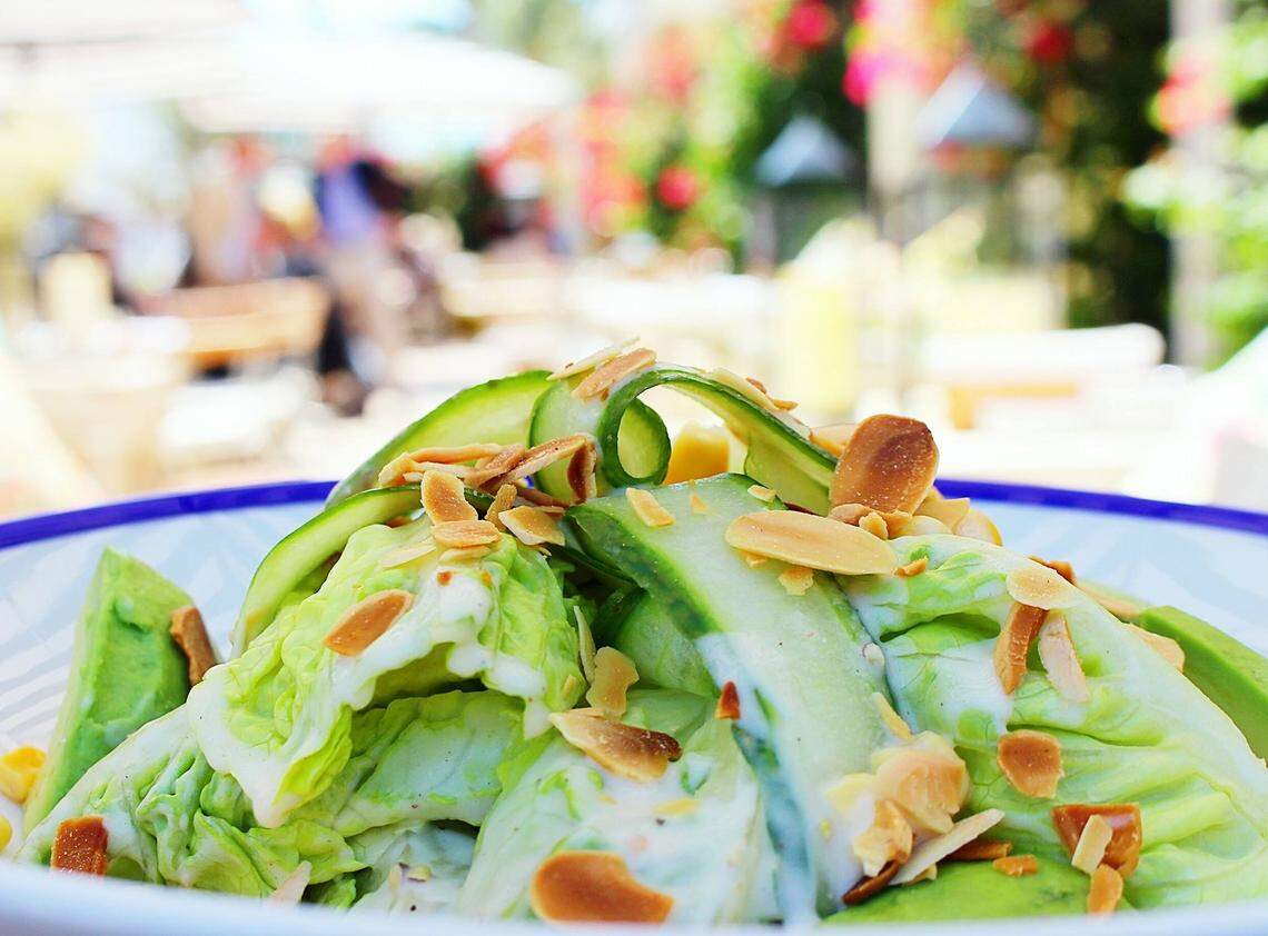 Salad with shaved cucumbers and slivered almonds at Call Me Gaby on South Beach