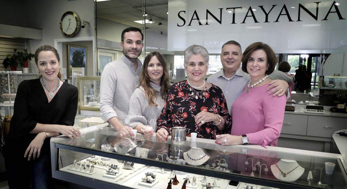 Miami, Florida, April 23, 2018 - Left to right - Elena Santayana, Rudy Santayana, Stacy Santayana, Marisa Santayana, Romy Sanchez and Miriam Sanchez of Santayana Jewelry. A video of a Cuban/Italian cafetera ring has lit up the internet. It’s the brainchild of Miami’s Santayana Jewelery, a family-run jewelry store in Miami. They custom-make all kinds of only-in-Miami jewelry but it was a ring of a coffee maker that people fell in love with.