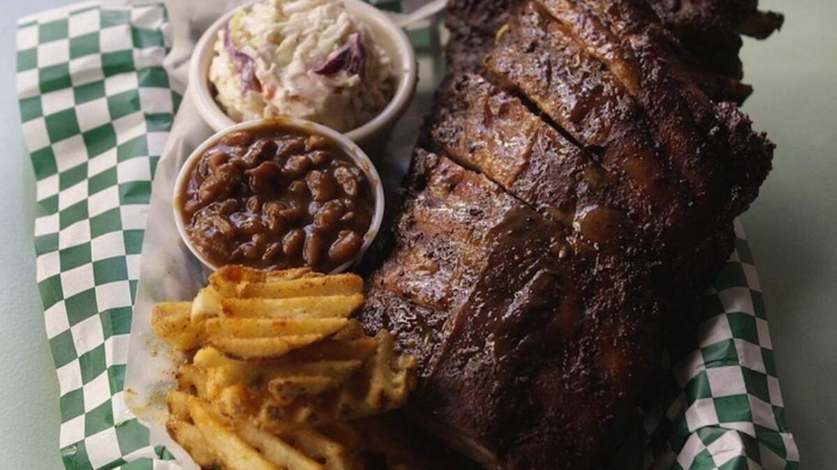 Spatky's Roadside Barbeque's famous Babyback Ribs with sides of Cole Slaw, BBQ Baked Beans ans Waffle Fries.