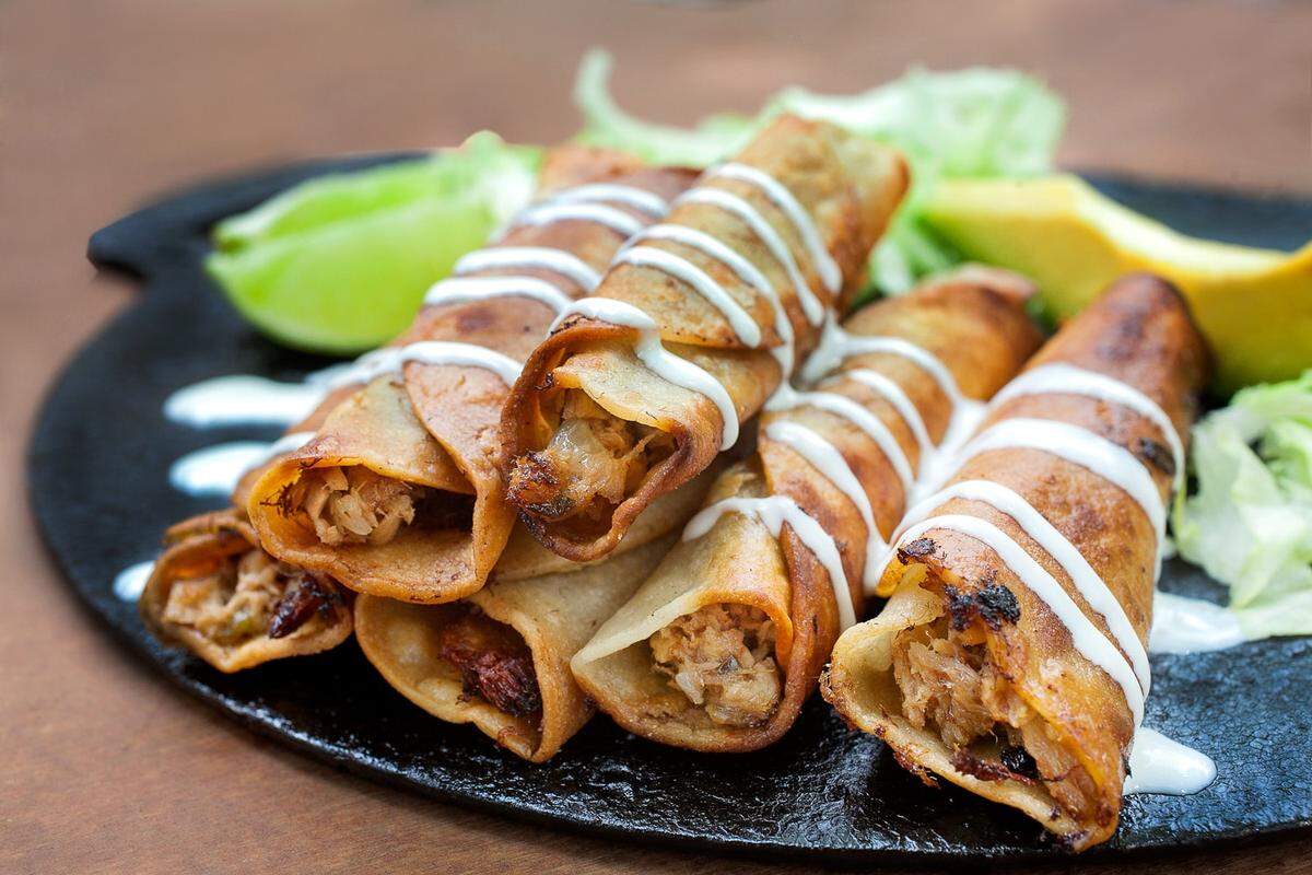 We will eat the hell out of these taquitos with some La Dulce salsa.