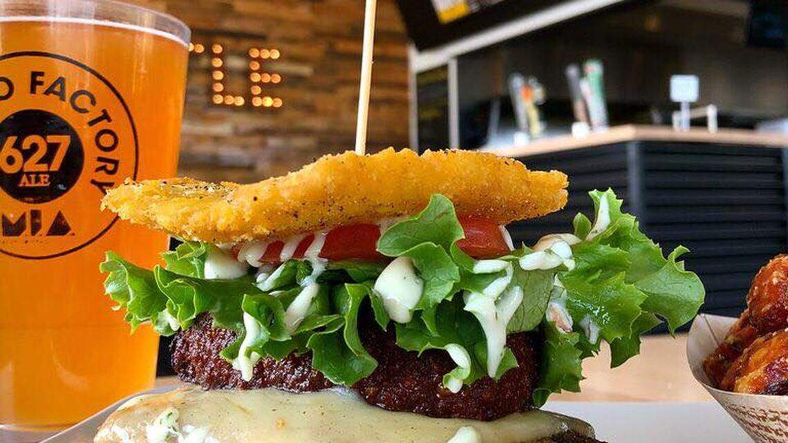 The humungeous sandwich of shredded beef and cheese between large flattened and twice fried plantain slabs, a specialy of Venezuela found at Caballo Viejo Restaurant.