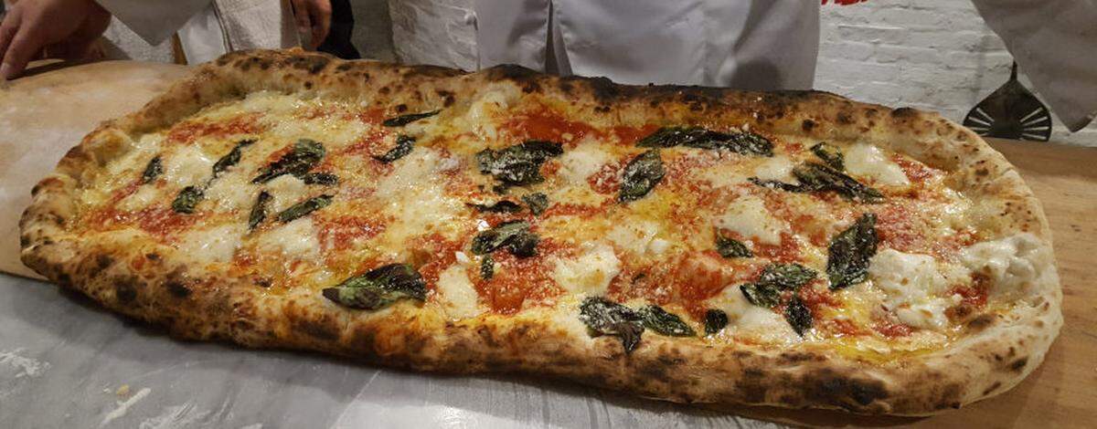 Giant pizza, that is how they roll at Antico.