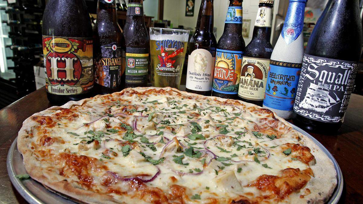 TRY A BEER TASTING: A barbecue chicken pizza and a sampling of Riverside’s 250 craft brews.