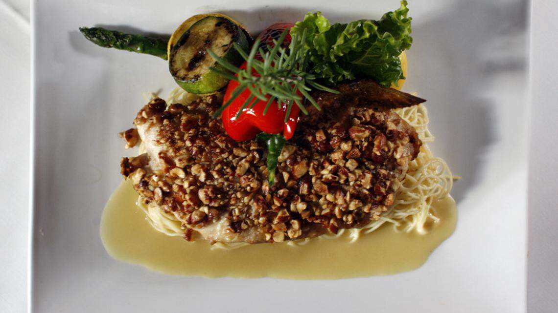 Smoked almond crusted snapper. Photo: Joe Rimkus Jr.