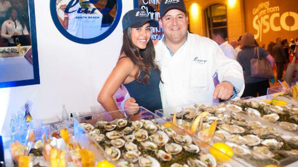 Lindsay Matute and executive chef Josh Capon of Lure Fishbar at the 2014 Taste of the Nation South Florida.