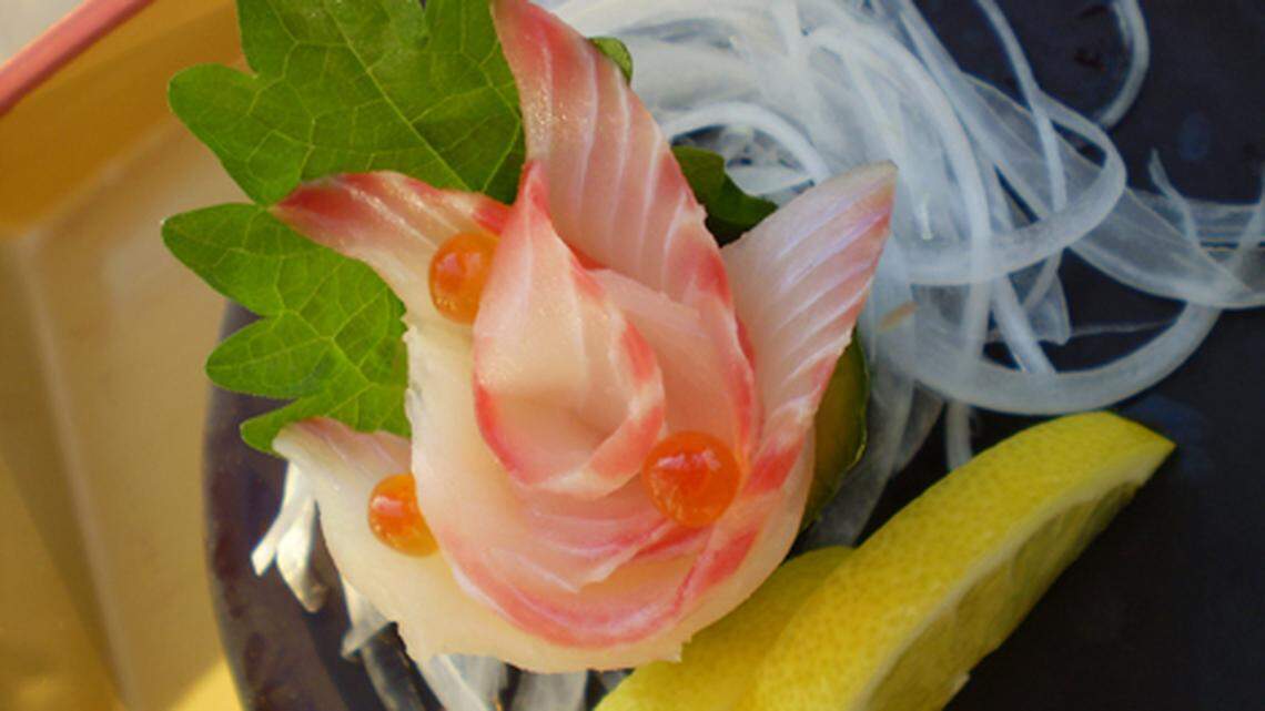 Sanpper and ikusra (salmon roe sushi wrapped in nori at Katana sushi bar in Normandy Isles, North Miami Beach.