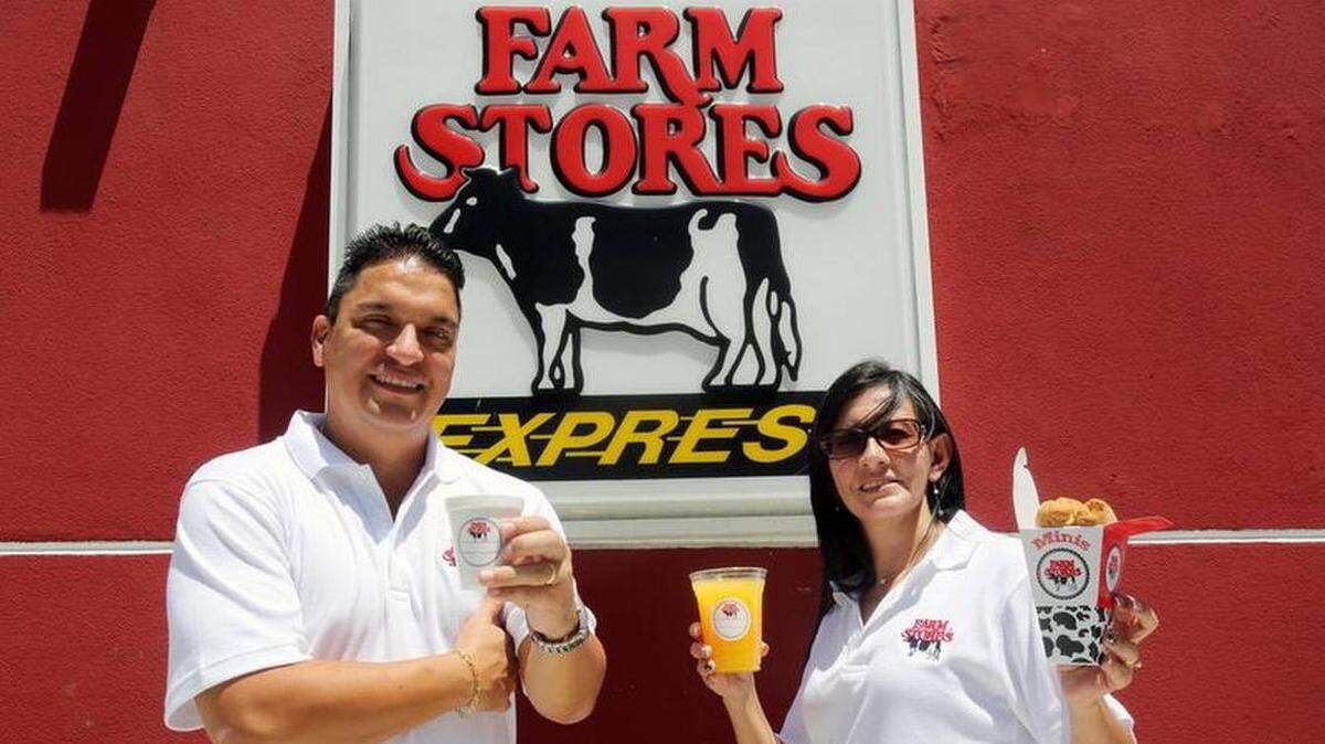 Luis Paez and his wife Paulina Pozo show favorite products like mini tequenos in the Farm Stores of Hialeah Gardens.