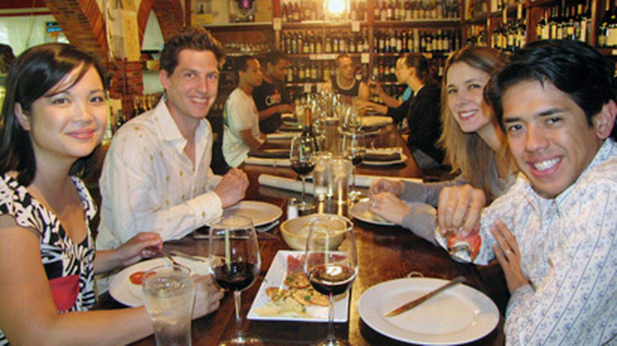 Bostonian couples Hien and Dylan Tierney, and Chanel and Kevin Dalal enjoy wine and tapas at El Carajo. Photo: Kyle Teal
