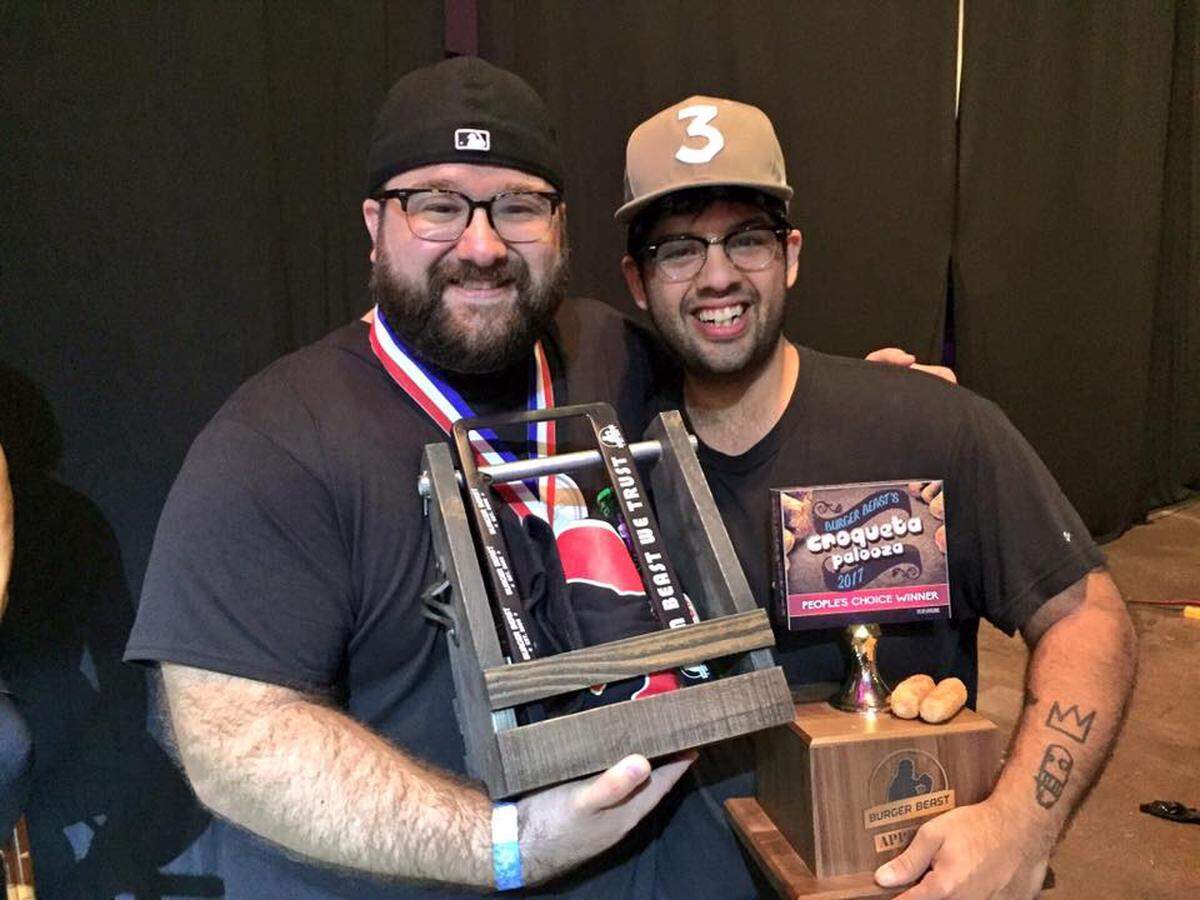 Chris Cuan (left) and Gregory Castillo's croquetas were judged the People's Choice at Croquetapalooza on Aug. 25.