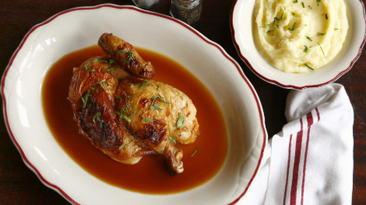 Roasted chicken with pureed potatoes at Le Zoo in Bal Harbour.