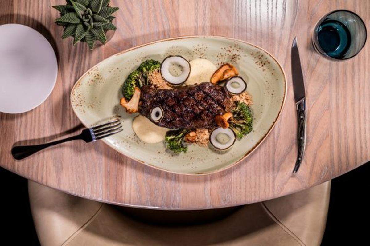 Dry-aged NY strip at The Strand Miami.