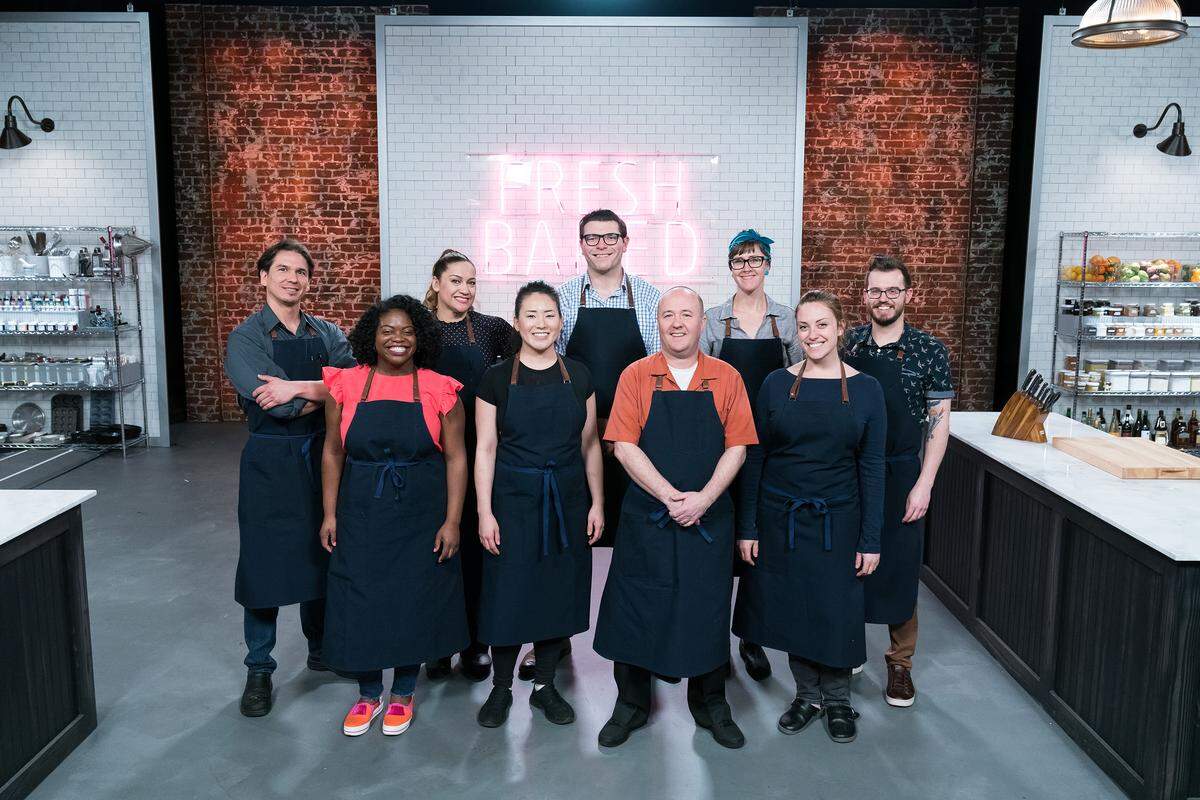 Max Santiago, back left, competes on Season 2 of Food Network’s “Best Bakers in America.”