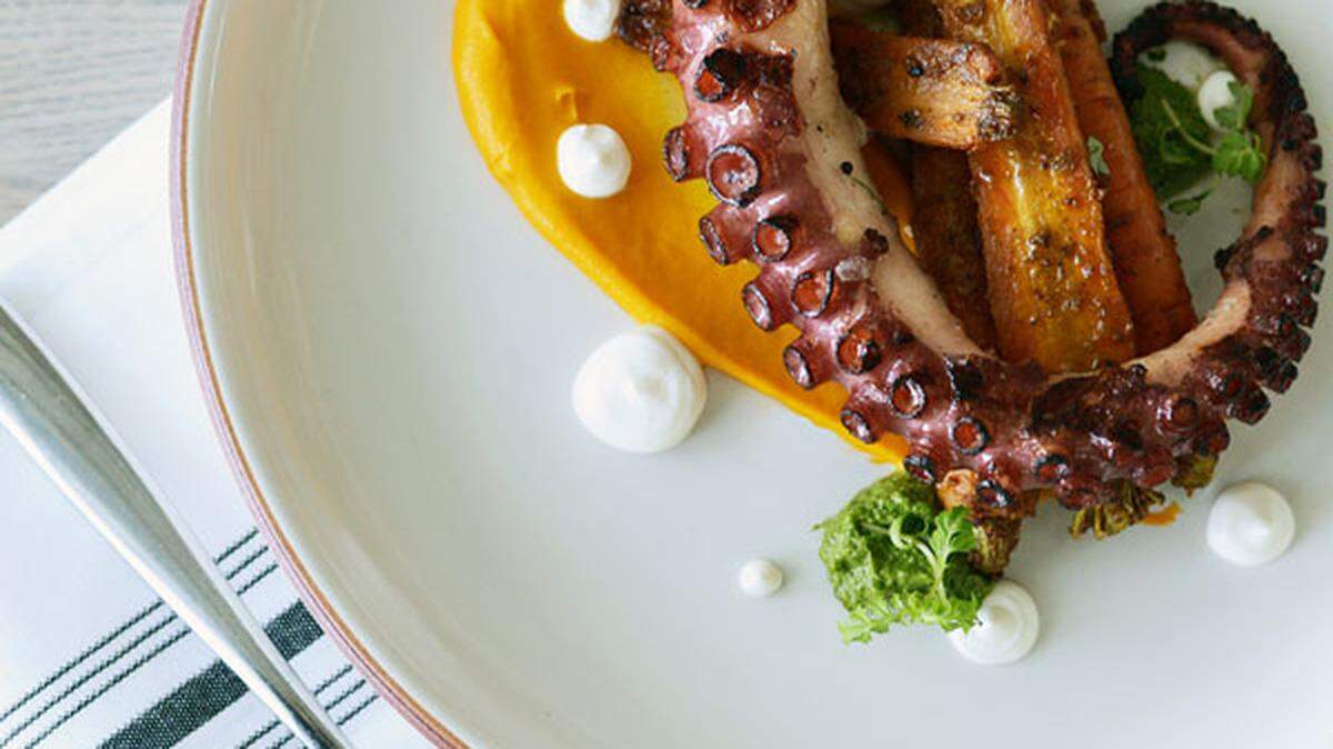 Chef Paula DaSilva has reemerged with Artisan Beach House, preparing dishes such as this octopus with vadouvan carrots.