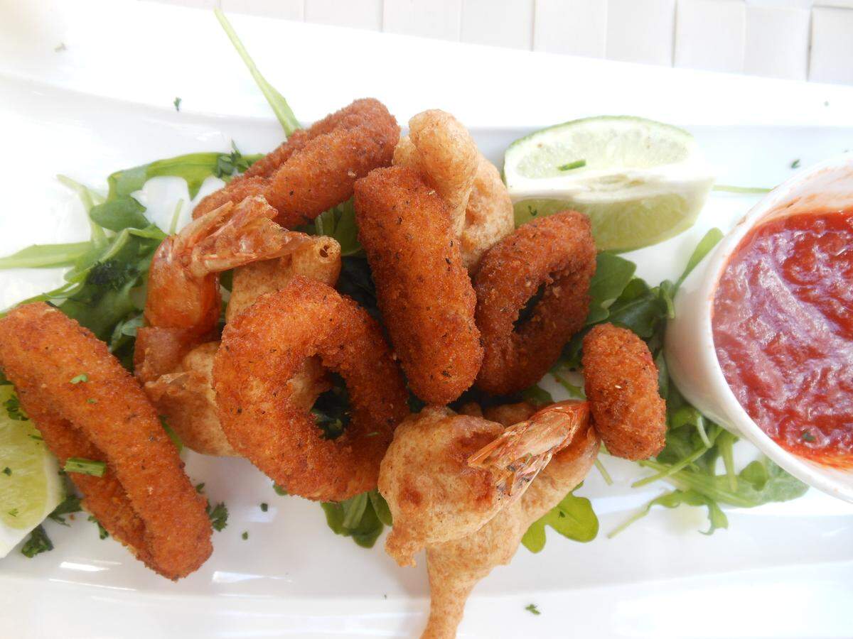 Breaded and fried squid rings, shrimp and cauliflower florets at Boteca Copacabana on Espanola Way in Miami Beach.