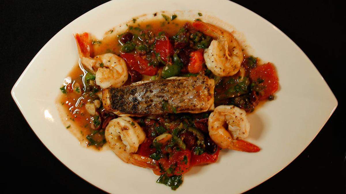 A plate of striped bass puttanesca at the Solita restaurant in Ft.Lauderdale.Photo: Joe Rimkus Jr.