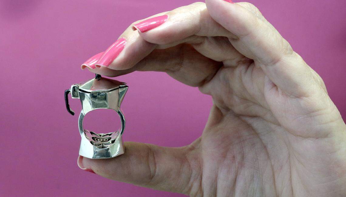 Miami, Florida, April 23, 2018 -  The Cafetera Ring, made by Santayana Jewelery in Miami.A video of a Cuban/Italian cafetera ring has lit up the internet. It’s the brainchild of Miami’s Santayana Jewelery, a family-run jewelry store in Miami. They custom-make all kinds of only-in-Miami jewelry but it was a ring of a coffee maker that people fell in love with.