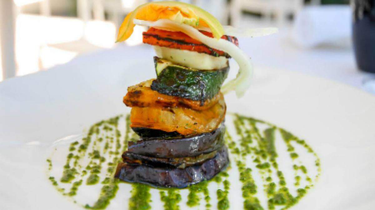 La Maison restaurant in Miami Beach serves a tower of grilled organic vegetables.