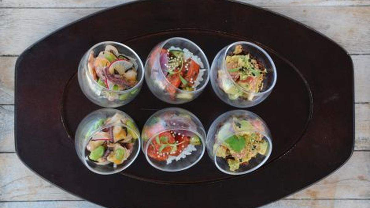 A trio of poke (tuna) offerings anchor the Watr menu (Handout)