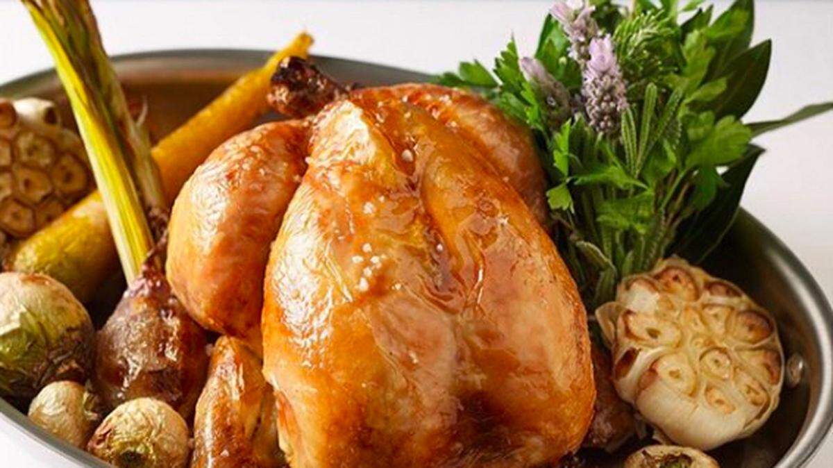 Roasted Chicken with thyme jus at The Surf Club Restaurant, chef Thomas Keller's first venture in South Florida.
