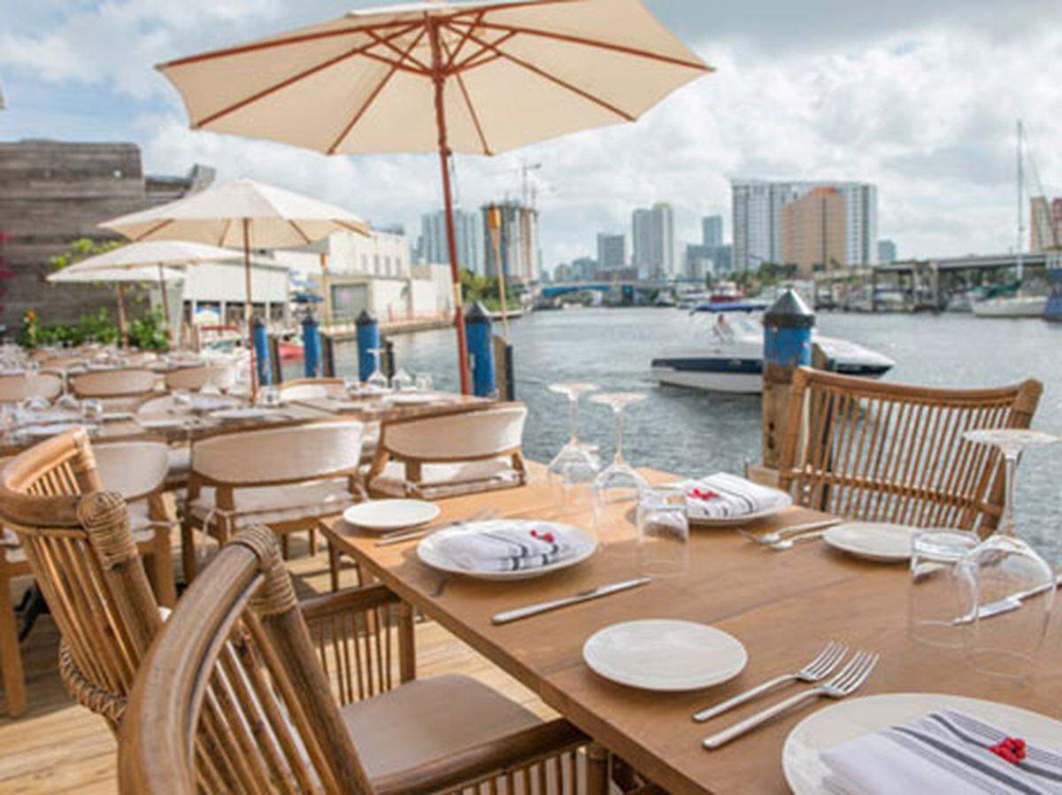 Seaspice Restaurant, located on the Miami River, is a chic dockside dining locale.