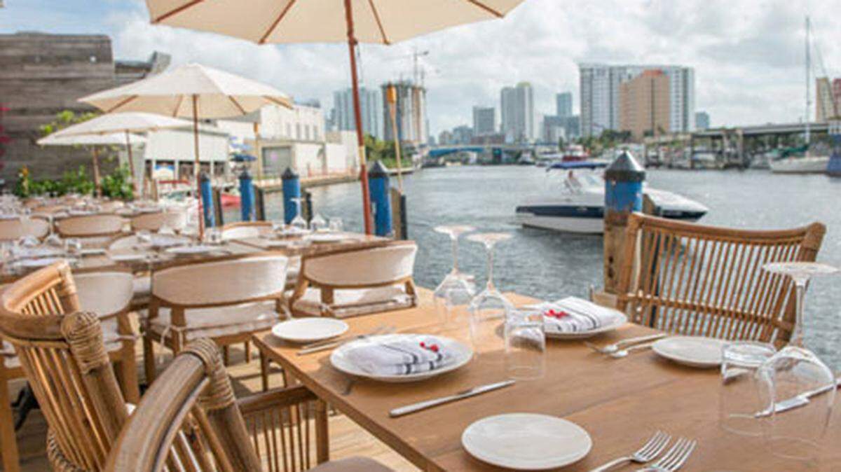 Seaspice Restaurant, located on the Miami River, is a chic dockside dining locale.