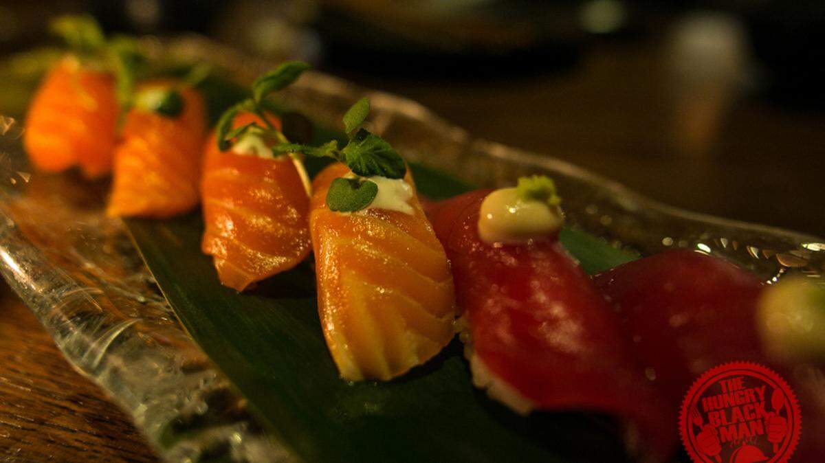 Kuro's salmon and tuna nigiri is served in a beautiful setting that best saved for post tax-return dining.