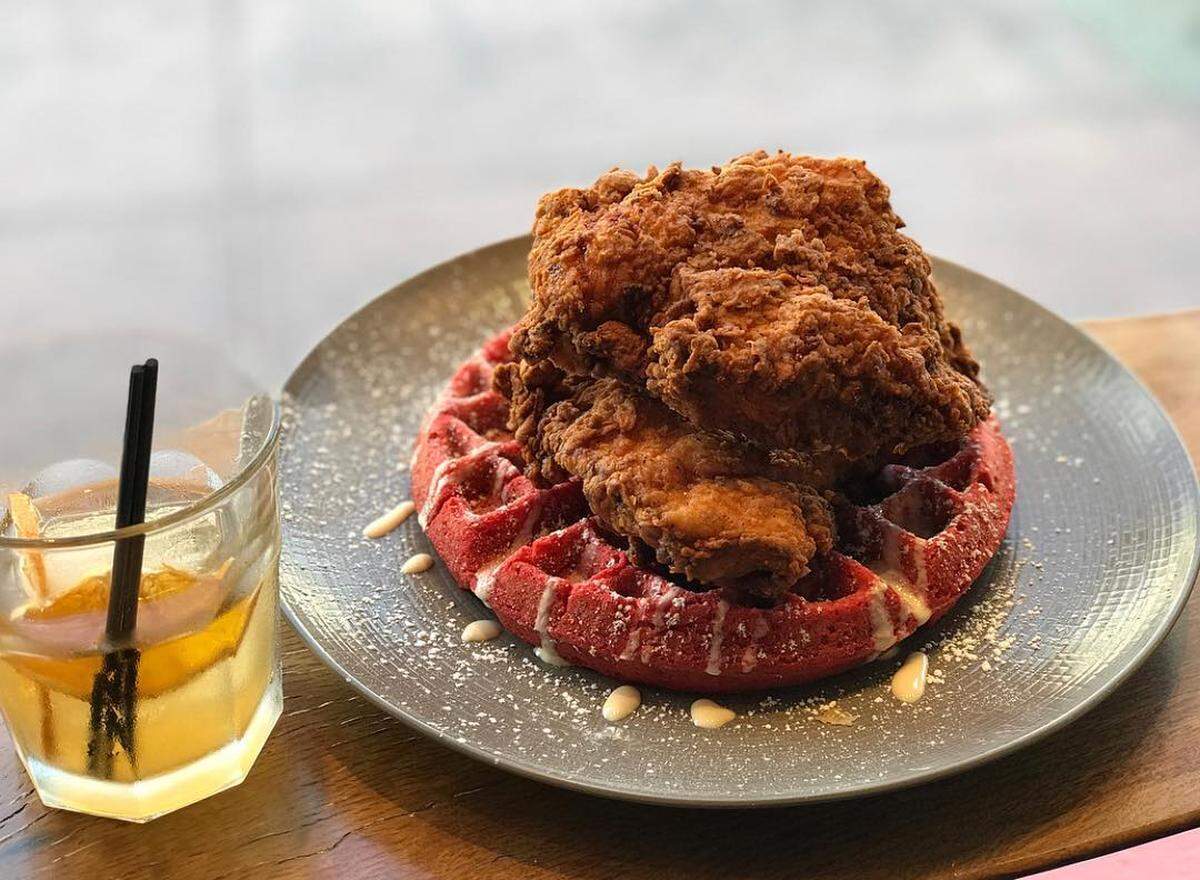 House of Mac also touts its fried chicken, such as this one served on a red velvet waffle.