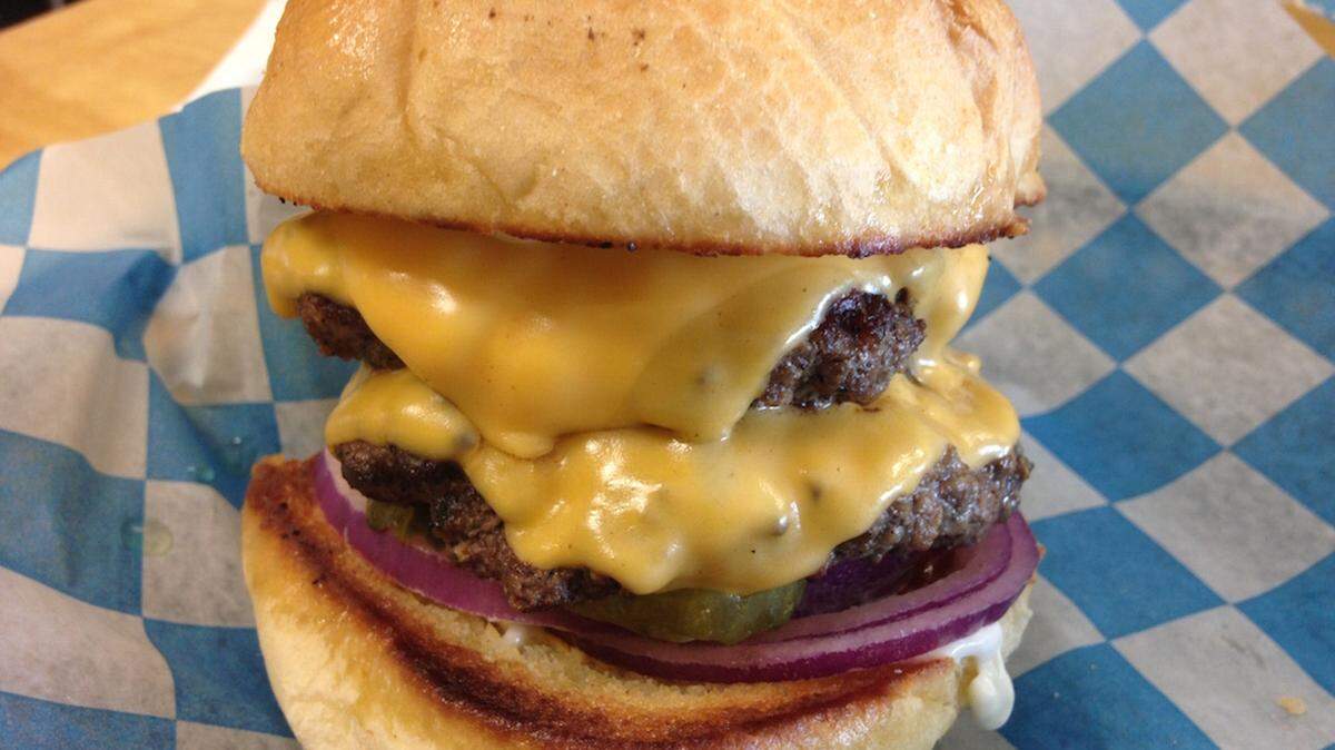 The burgers at Larry, Curly, Burgers & Moe are no joke, Burger Beast says.