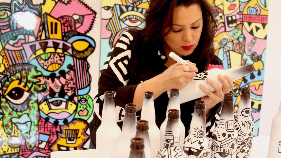 The artist Lola Blu has hand-painted 150 bottles of a limited-production beer from Wynwood Brewing.