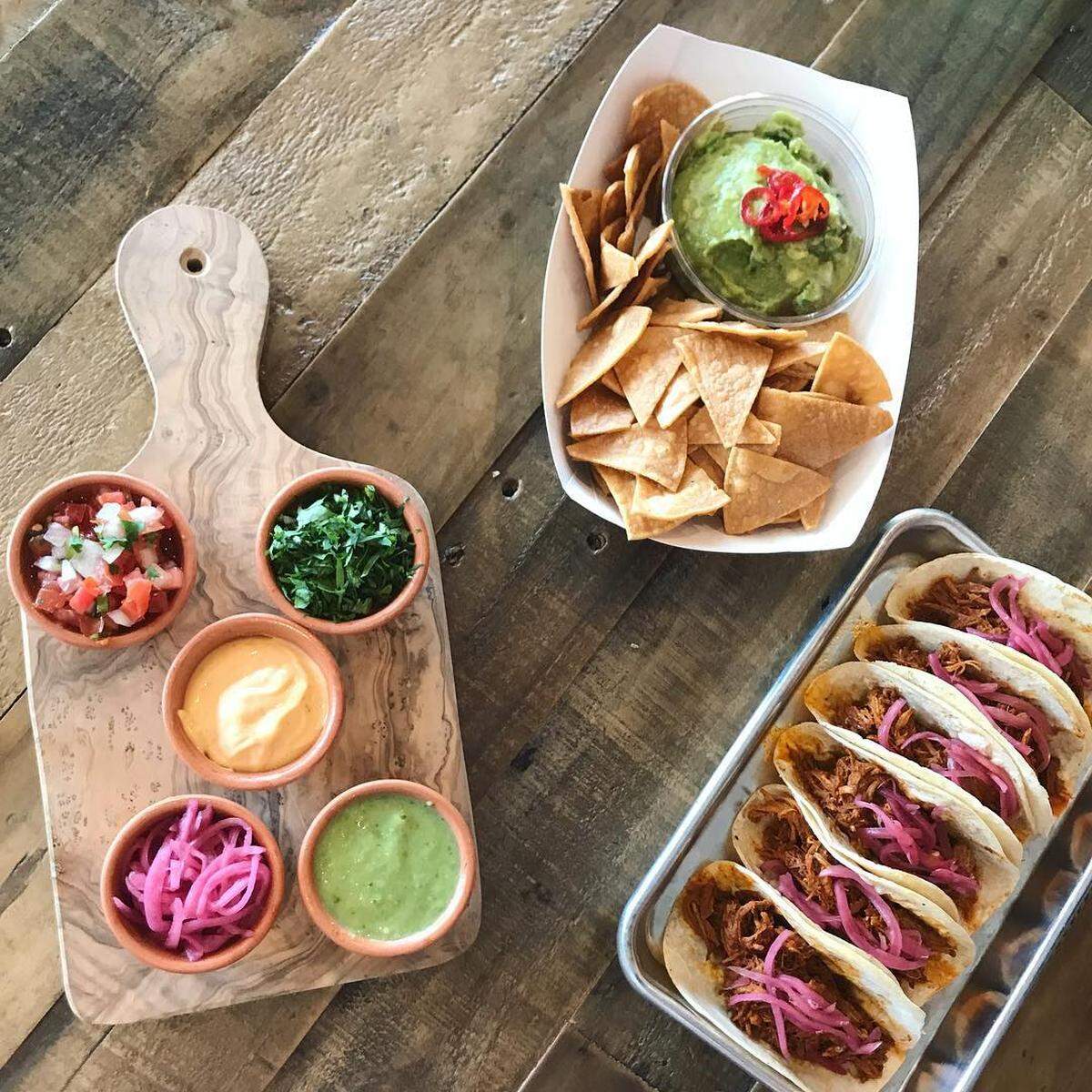A wide variety of tacos, from vegetarian to roasted pork, are available at 222 Taco.