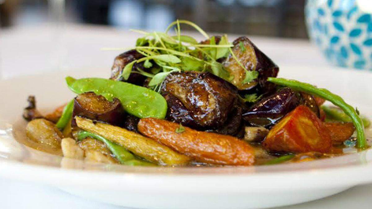 Soba noodles with carrots, mushrooms and Japanese eggplant in a miso broth at Marti's. Photo by Ian Ibbetson.
