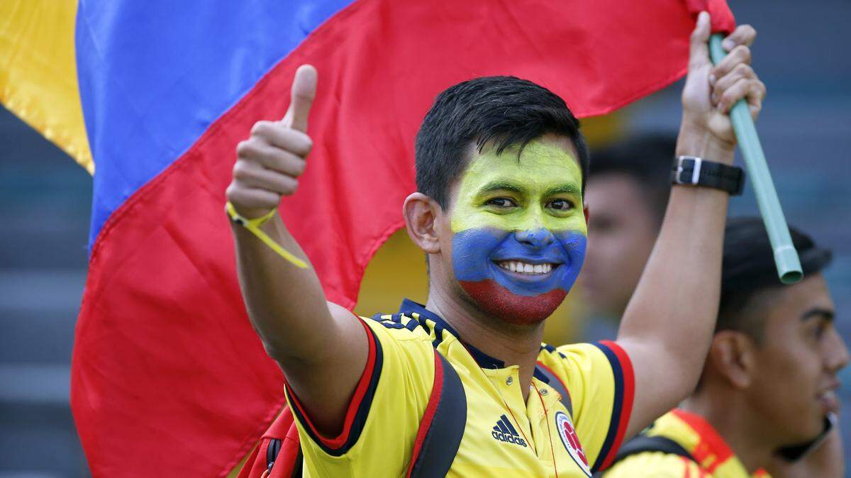 This Colombian futbol fan is wondering where he can find a bandeja paisa.