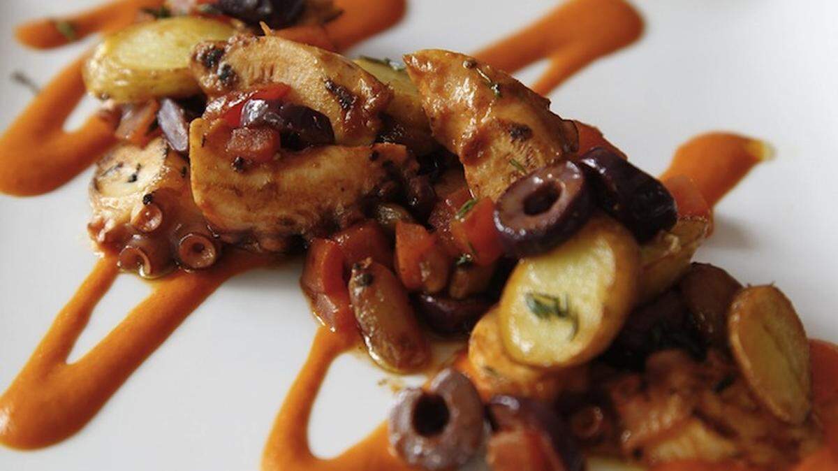 Grilled Octopus with fingerling potatoes, roasted garlic and peppers, thyme, and EVOO- 14 photographed at Jean Paul's House on Monday, June 4, 2012 in Miami, Florida.