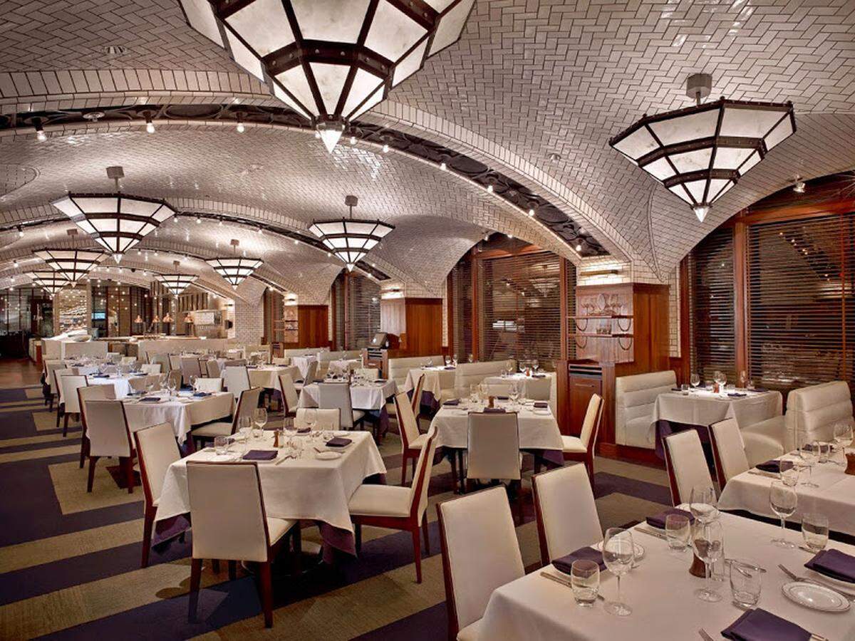 The dining room at Lobster Bar Sea Grille is like church for seafood fanatics.