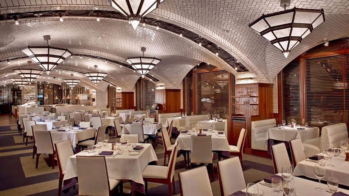 The dining room at Lobster Bar Sea Grille is like church for seafood fanatics.