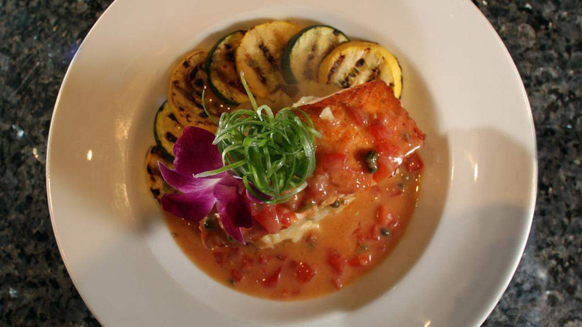 Blue Plate, restaurant inside the Seminole Hard Rock Hotel &amp; Casino in Hollywood. Tomato Caper Salmon one of the signature dishes. Photo: Joe Rimkus.