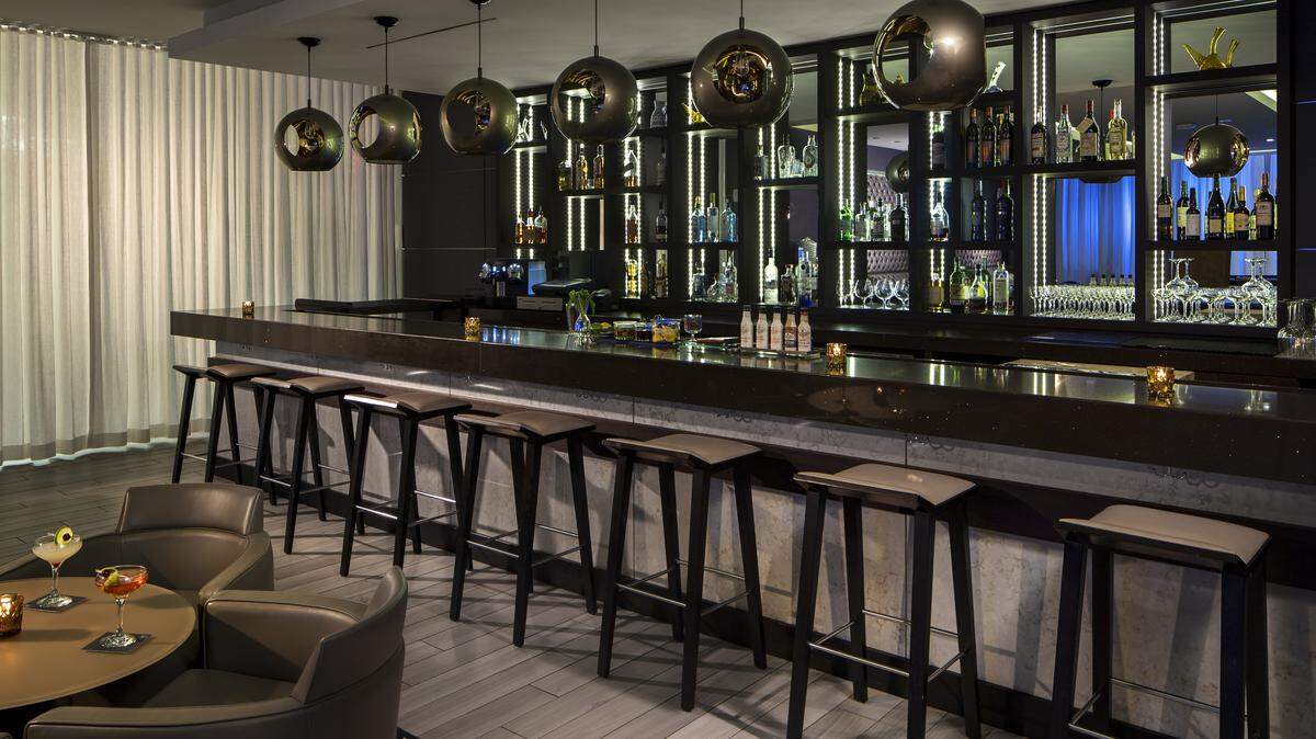 Gin + Collins takes over in the former AC Hotel lounge space, with new decor and an overhauled drinks program. It gets its name from being situated on Collins Avenue. (Handout)