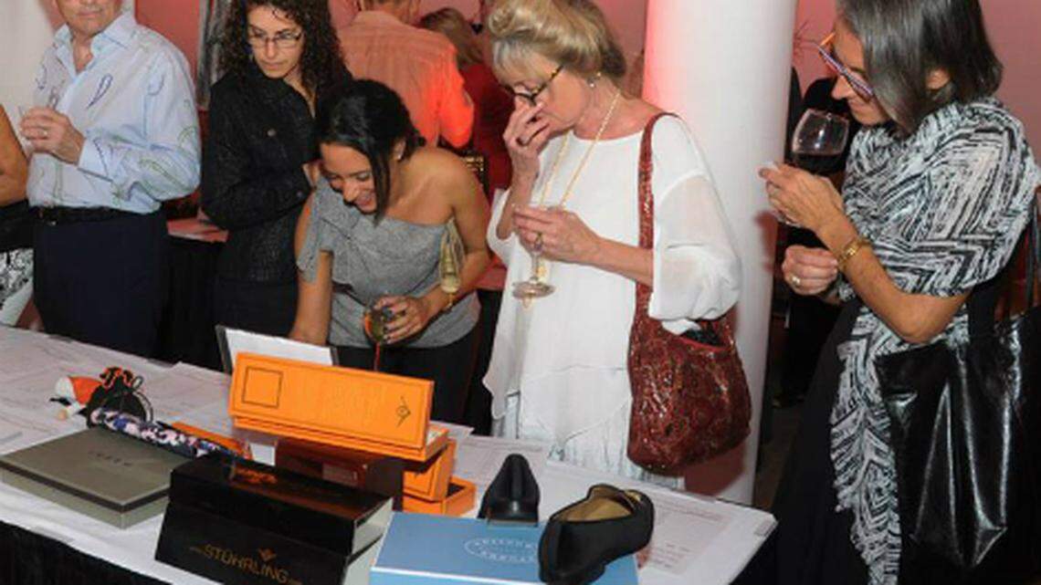 Guests bid on auction items at the 2014 Taste of Design gala. This year's is Nov. 14.