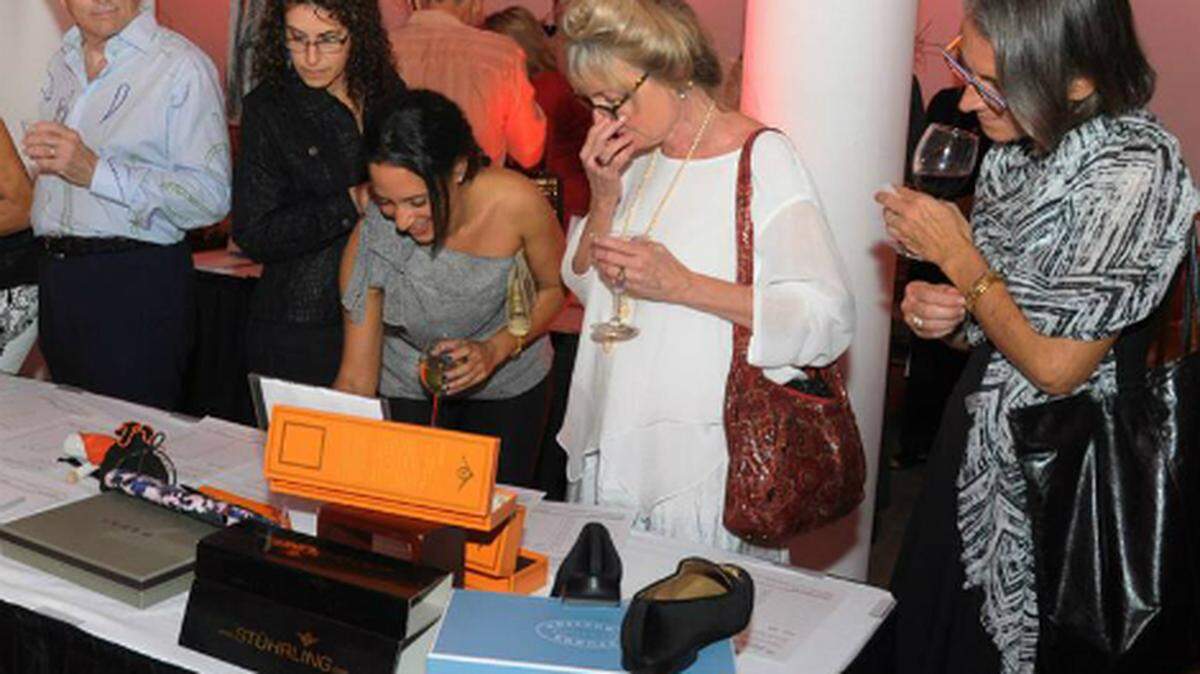 Guests bid on auction items at the 2014 Taste of Design gala. This year's is Nov. 14.