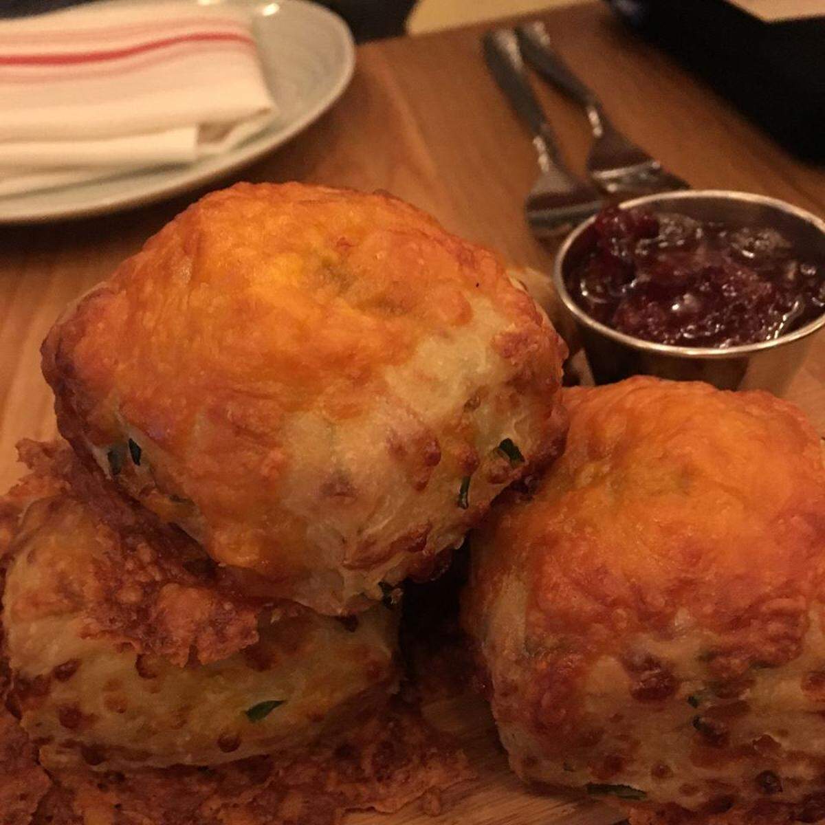Florida cheddar and chive biscuits with strawberry jam at Bird &amp; Bone.