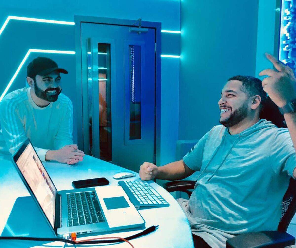 Enrique Santos, left, and DJ Xtreme (Xavier Figueroa) parody popular songs on Miami's 94.9 FM morning show, which is syndicated nationally from 6-10 a.m. Their latest is "Pastelito," a riff on "Está Rico" by Marc Anthony, a personal friend of Santos.'
