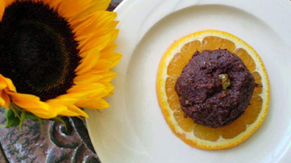 Shredded coconut and raw chocolate macaroon stuffed with a walnut at Green Gables Cafe.Photo: Linda Bladholm.
